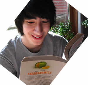 stev reading a book and smiling